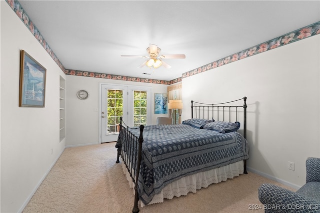 carpeted bedroom featuring access to outside and ceiling fan