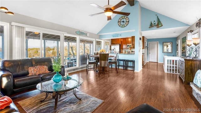 469 Staniel Cay Dr, Osage Beach, MO 65065 - living room featuring high vaulted ceiling, ceiling fan, wood finished floors, and beamed ceiling