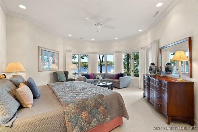 carpeted bedroom featuring ceiling fan, crown molding, a water view, and french doors