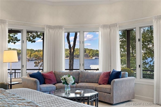 sunroom with a water view