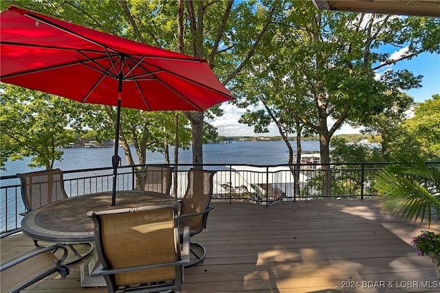 deck featuring a water view