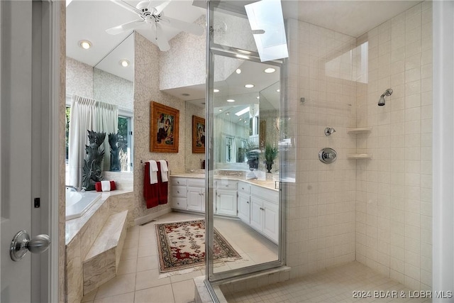 bathroom with vanity, tile patterned floors, ceiling fan, and independent shower and bath