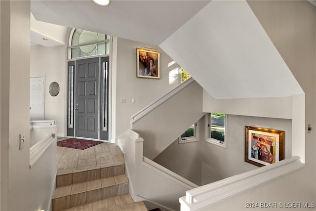 entrance foyer with lofted ceiling