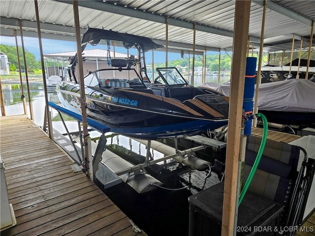 dock area with a water view