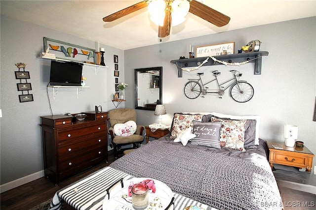 bedroom featuring dark hardwood / wood-style flooring and ceiling fan