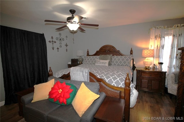 bedroom featuring ceiling fan and dark wood-type flooring