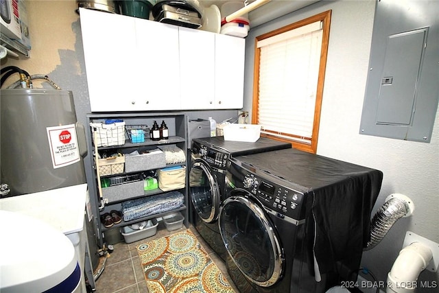 laundry room featuring cabinets, electric water heater, independent washer and dryer, tile patterned floors, and electric panel