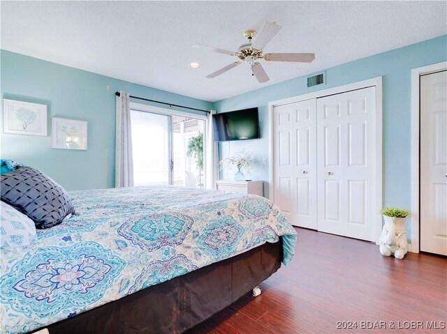 bedroom featuring dark hardwood / wood-style floors and ceiling fan