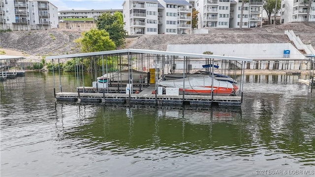 view of dock with a water view