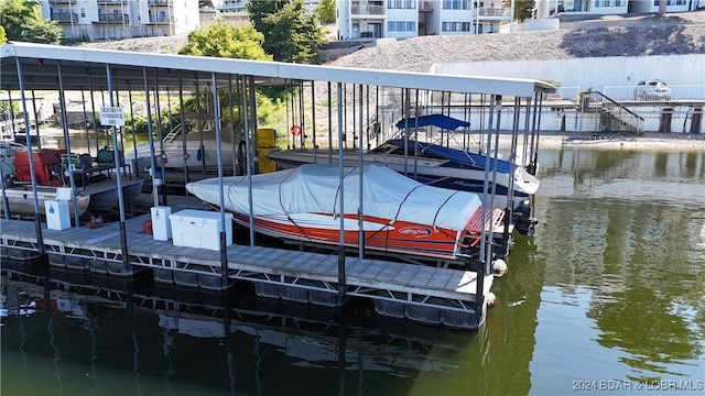 dock area with a water view