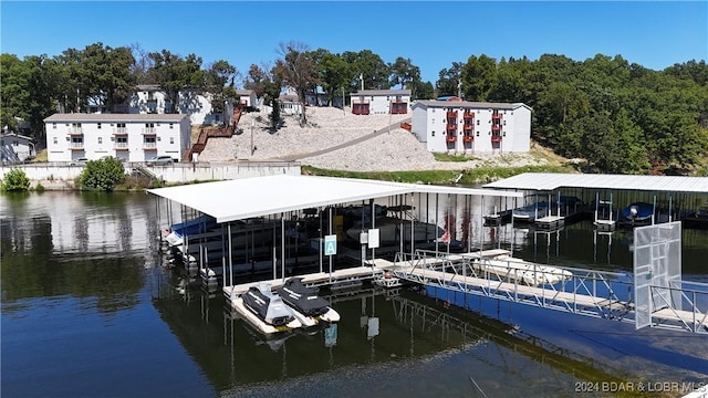 view of dock with a water view