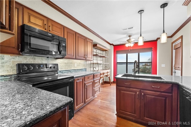 kitchen featuring decorative backsplash, sink, ceiling fan, and black appliances