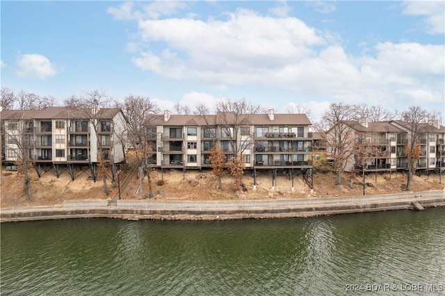 exterior space with a water view