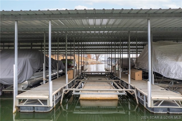 view of dock with a water view