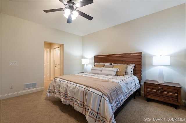 carpeted bedroom featuring ceiling fan