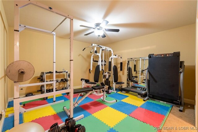 workout area featuring ceiling fan