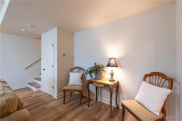 living area with light hardwood / wood-style floors