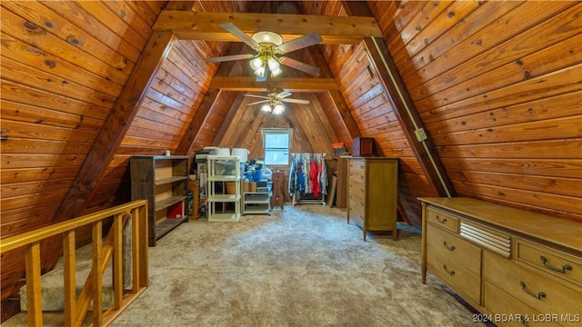 additional living space featuring lofted ceiling with beams, wood walls, carpet, and wood ceiling