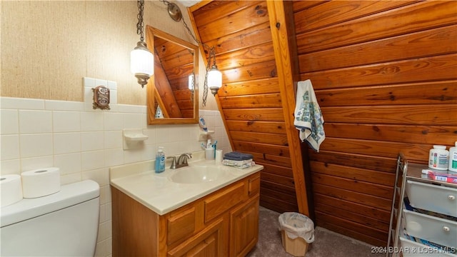 half bathroom with toilet and vanity