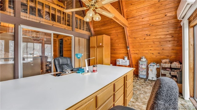 kitchen with vaulted ceiling with beams, a wall mounted AC, ceiling fan, wooden walls, and wooden ceiling