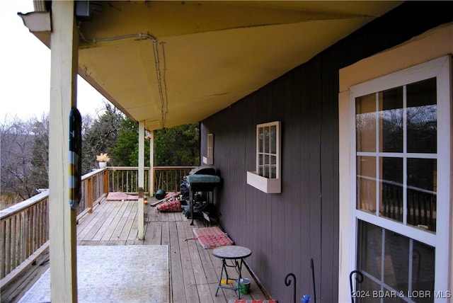 wooden deck with grilling area