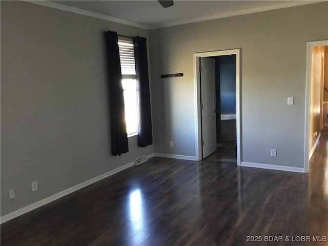 interior space with dark wood-type flooring and ornamental molding