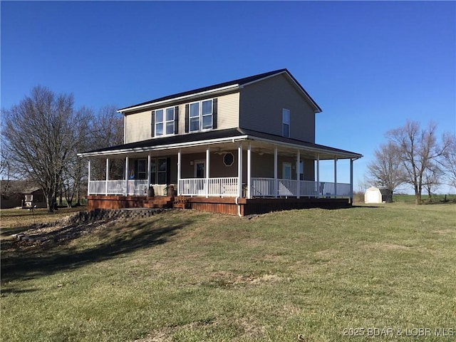 farmhouse featuring a porch and a front lawn