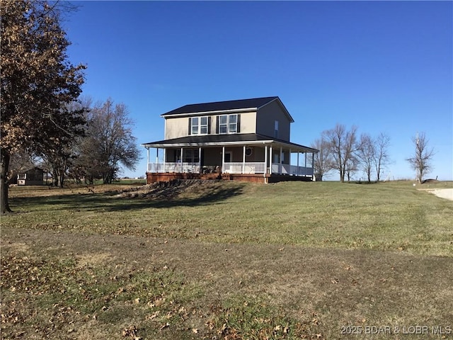 view of front of house with a front lawn and a porch