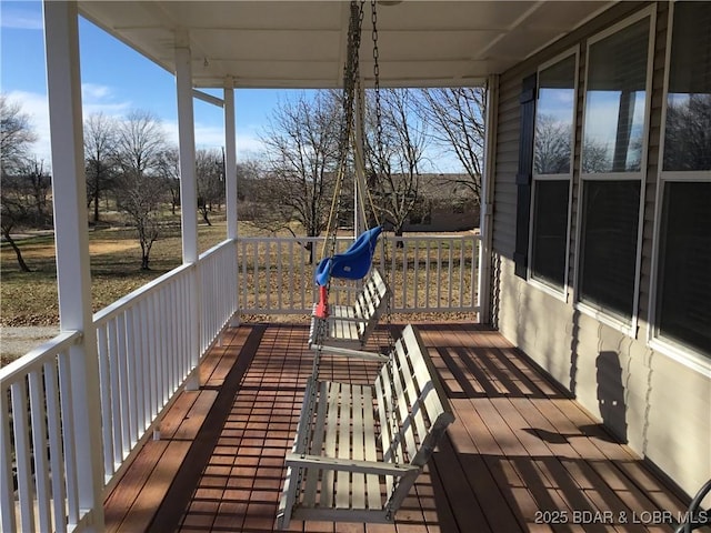 wooden deck with a porch