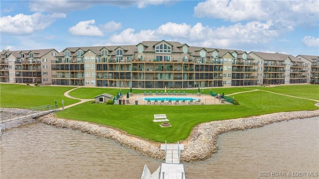 view of property with a water view