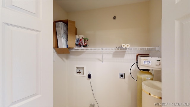 laundry room with washer hookup and electric dryer hookup