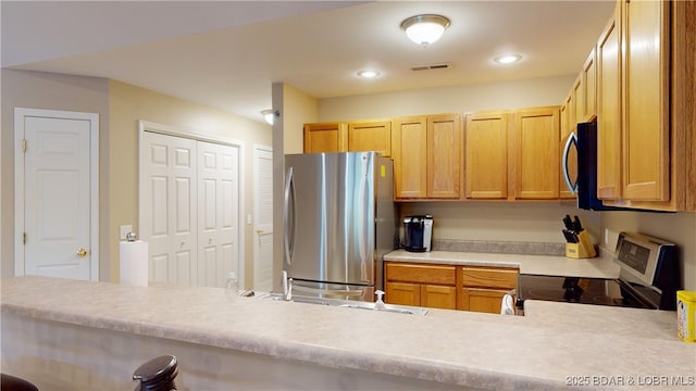 kitchen featuring appliances with stainless steel finishes