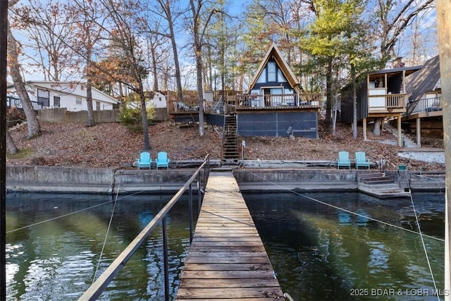 dock area with a water view