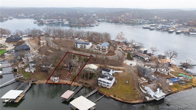 drone / aerial view with a water view