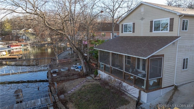 exterior space featuring a sunroom