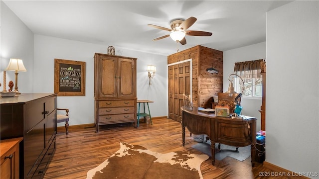 office space with light hardwood / wood-style flooring and ceiling fan