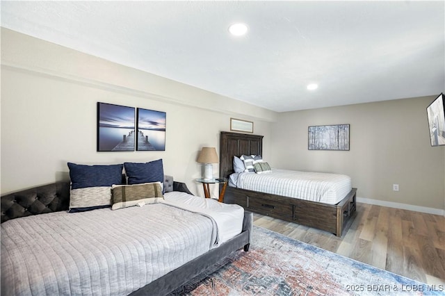 bedroom with light wood-type flooring