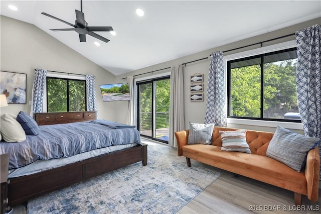 bedroom featuring vaulted ceiling, access to outside, ceiling fan, and light hardwood / wood-style flooring