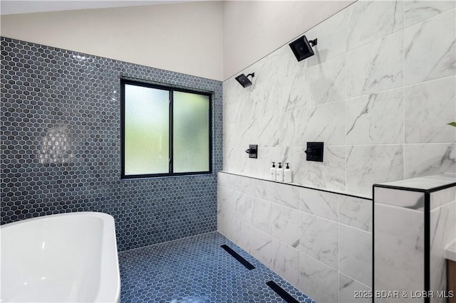 bathroom with tile walls and independent shower and bath