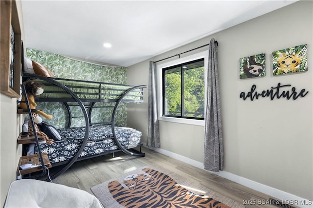 bedroom with light hardwood / wood-style floors