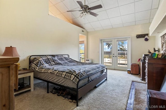 bedroom featuring french doors, a ceiling fan, light carpet, vaulted ceiling, and access to outside