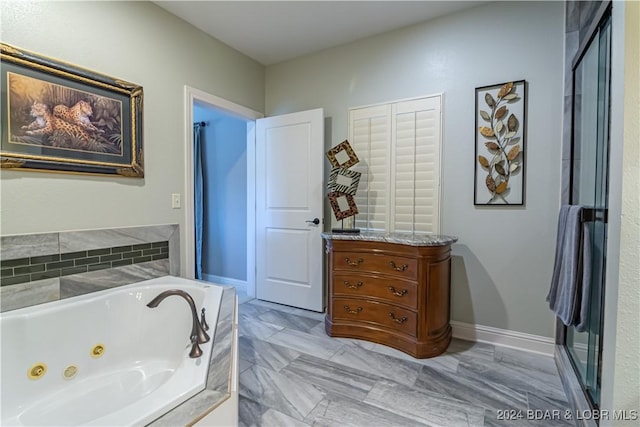 bathroom with independent shower and bath