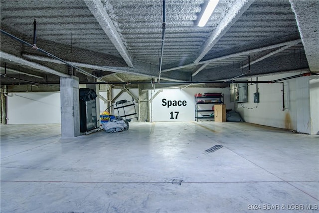 garage featuring a carport