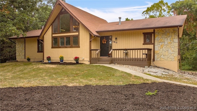 back of house featuring a yard