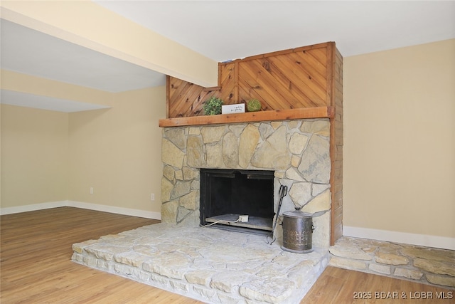 interior details with beamed ceiling and hardwood / wood-style flooring