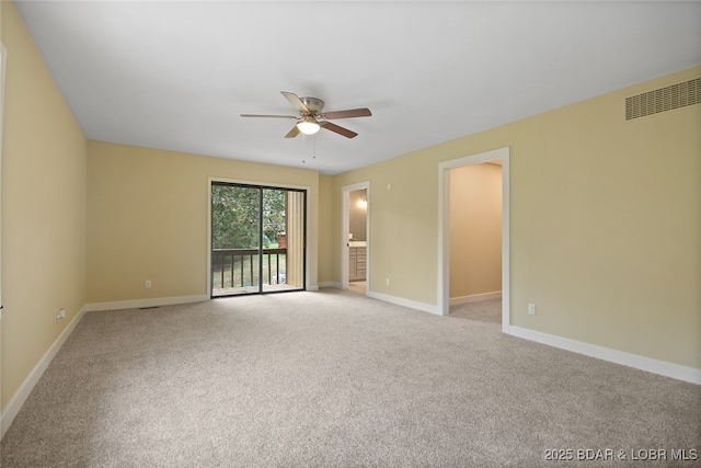 unfurnished room featuring light carpet and ceiling fan