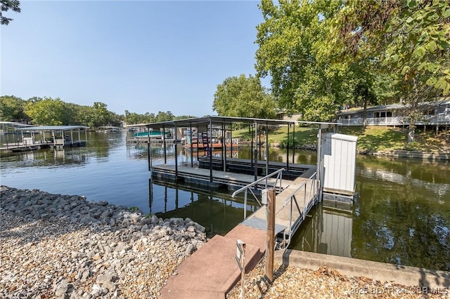 view of dock with a water view