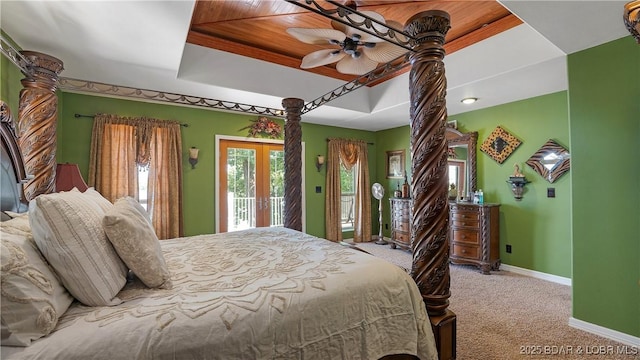 carpeted bedroom featuring ceiling fan, access to exterior, and wooden ceiling