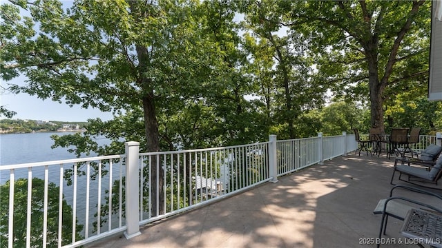 view of patio / terrace featuring a water view