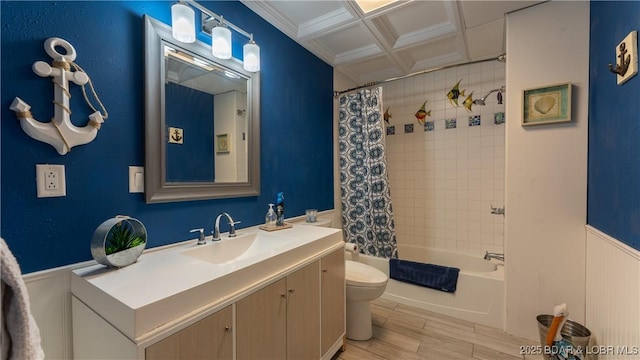 full bathroom with vanity, shower / tub combo, and toilet